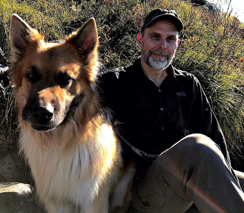 UW’s Matt Kaeberlein, seen here with his dog, Dobby, wants to understand the aging process in dogs. (Family photo)
