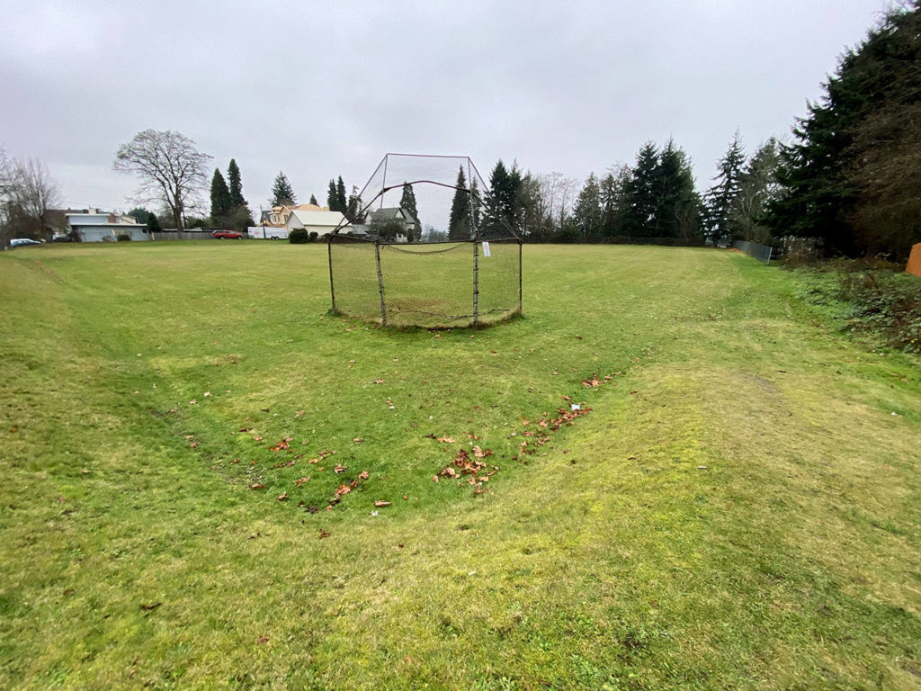 A solitary backstop sits on the Norton playfield Wednesday morning. (Sue Misao / The Herald)
