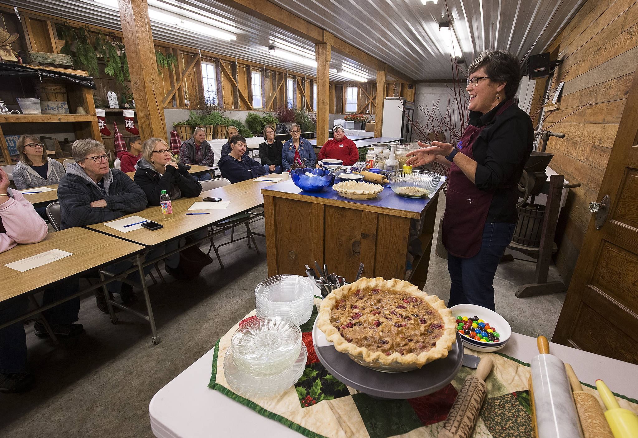 Karen Fuentes teaches how to make a cranberry and hazelnut pie during a class at Hazel Blue Acres hazelnut and blueberry farm. (Andy Bronson / The Herald)