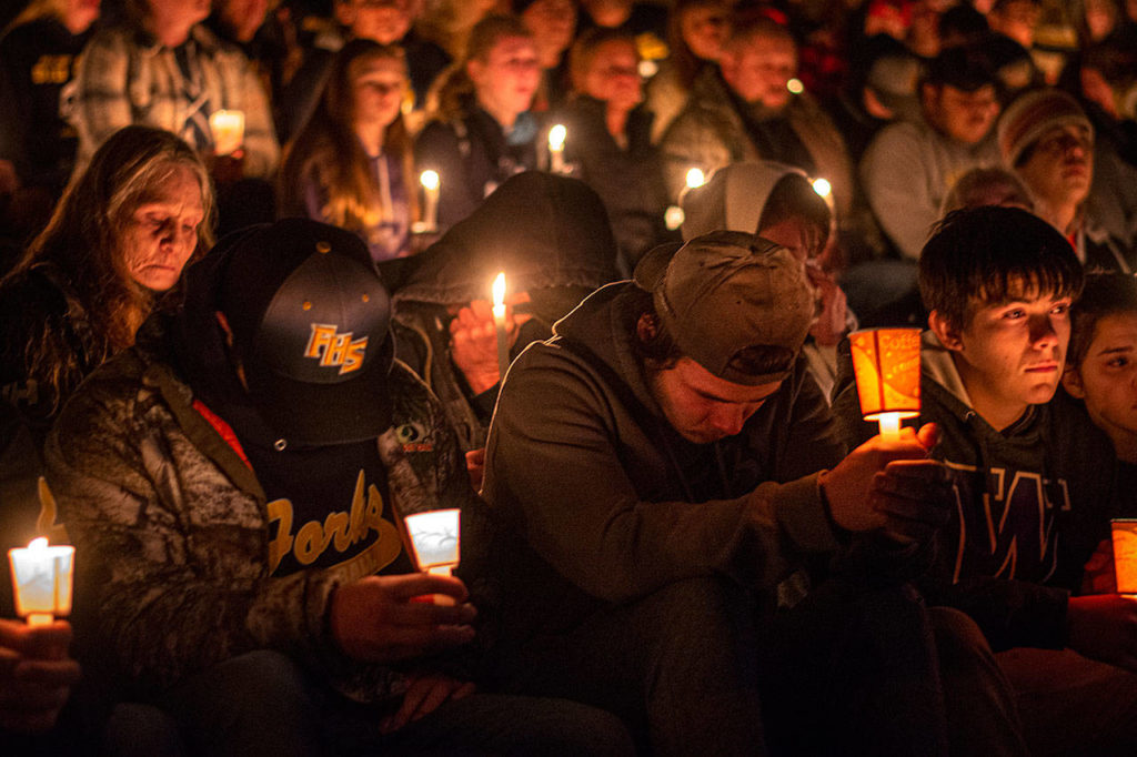 Hundreds gathered at Spartan Stadium in Forks to mourn Tristen Pisani on Thursday. (Jesse Major / Peninsula Daily News)
