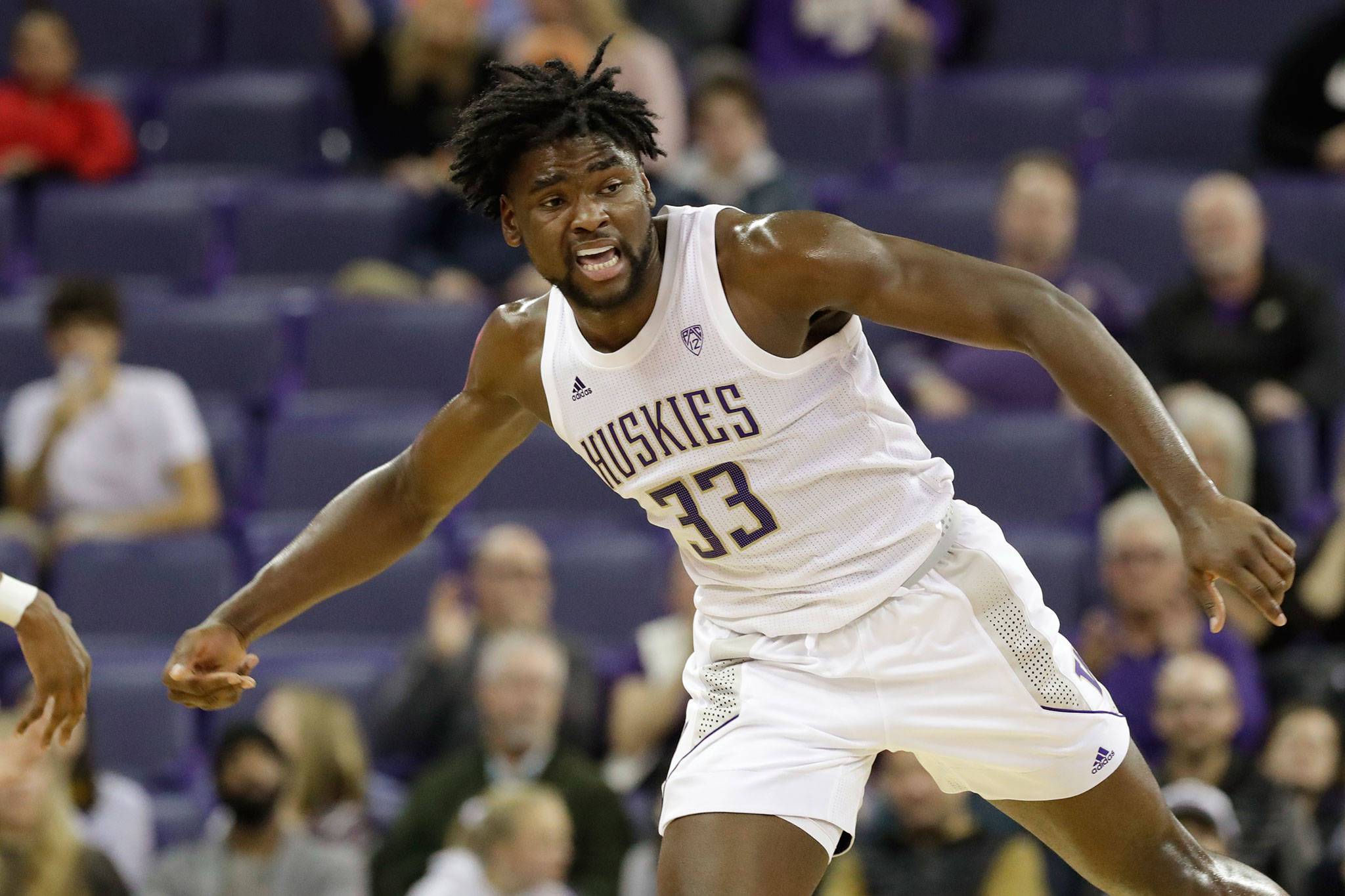 Washington’s Isaiah Stewart reacts after scoring late in the second half of a game against Montana on Nov. 22, 2019, in Seattle. Washington won 73-56. (AP Photo/Elaine Thompson)