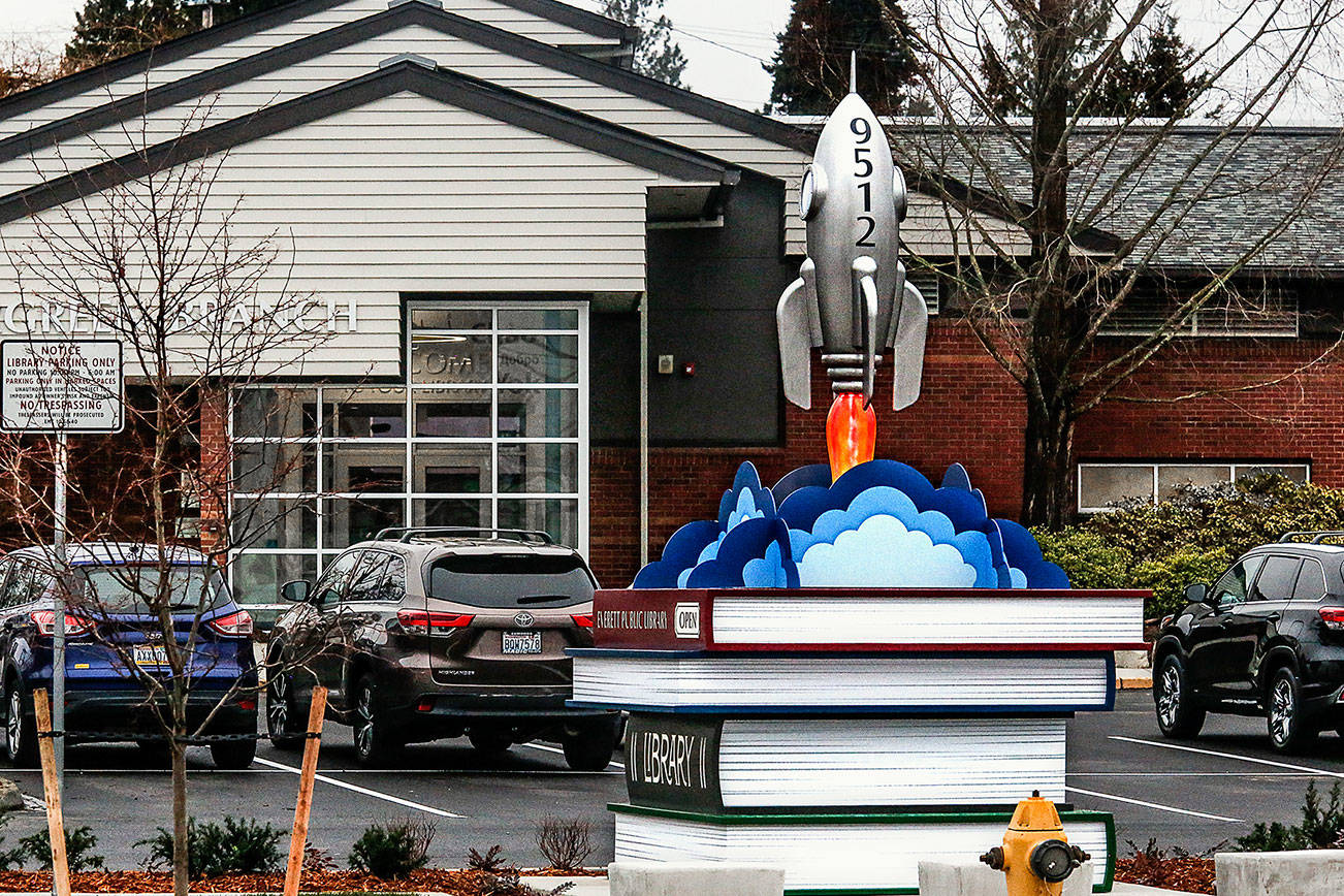 The Evergreen Branch of the Everett Public Library is open and ready for blast off. Dillon Works, of Mukilteo, designed this eye-catching sculpture that greets people along Evergreen Way. (Dan Bates / The Herald)