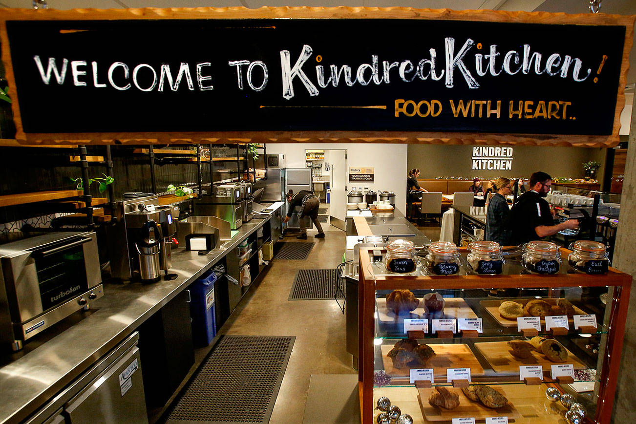 With the warm atmosphere, freshly made food and a big sign, customers should find their way to Kindred Kitchen, part of HopeWorks Station on Broadway in Everett. (Dan Bates / The Herald)