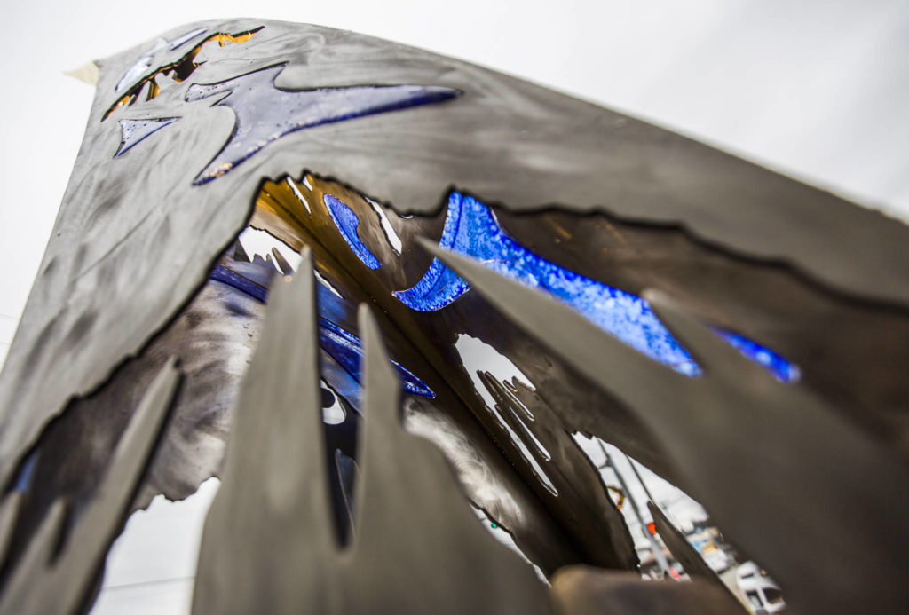 An up-close look at the “Guardians of the Mountain Pass” sculpture on the southeast corner of Main and Lewis streets in Monroe. (Olivia Vanni / The Herald)
