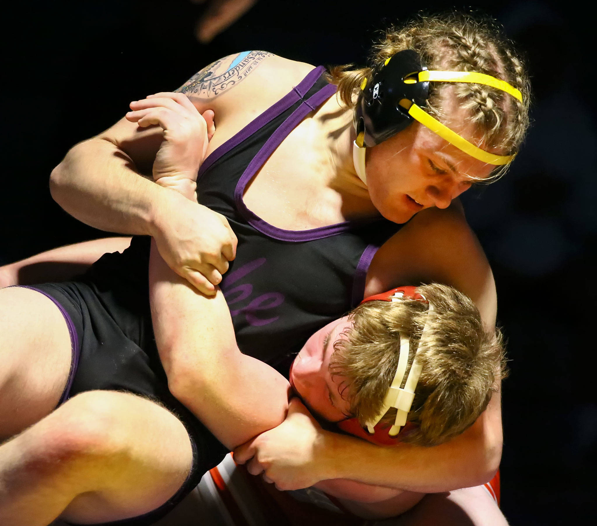 Lake Stevens’ Brandon Poe works to pin Stanwood’s Mason Ferguson Thursday evening at Lake Stevens High School on December 12, 2019. Lake Stevens won 49-24. (Kevin Clark / The Herald)