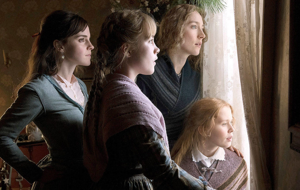Emma Watson, from left, Florence Pugh, Saoirse Ronan and Eliza Scanlen in a scene from “Little Women.” (Wilson Webb/Sony Pictures)
