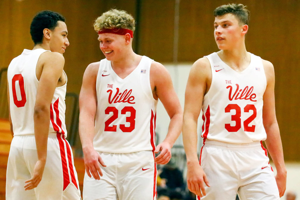 Marysville Pilchuck’s Ethan Jackson (left-right), Cameron Stordahl and Aaron Kalab are among a slew of returning seniors from last year’s historic team that earned a program-best fourth-place state trophy. (Kevin Clark / The Herald)
