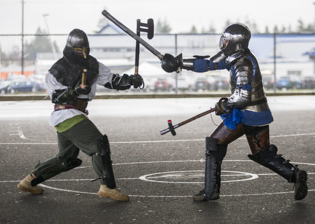 Derek Stump, whose persona is Gudrod Bjornson, fights with Douglas West, who goes by the name George Slade, during a practice battle. (Olivia Vanni / The Herald)
