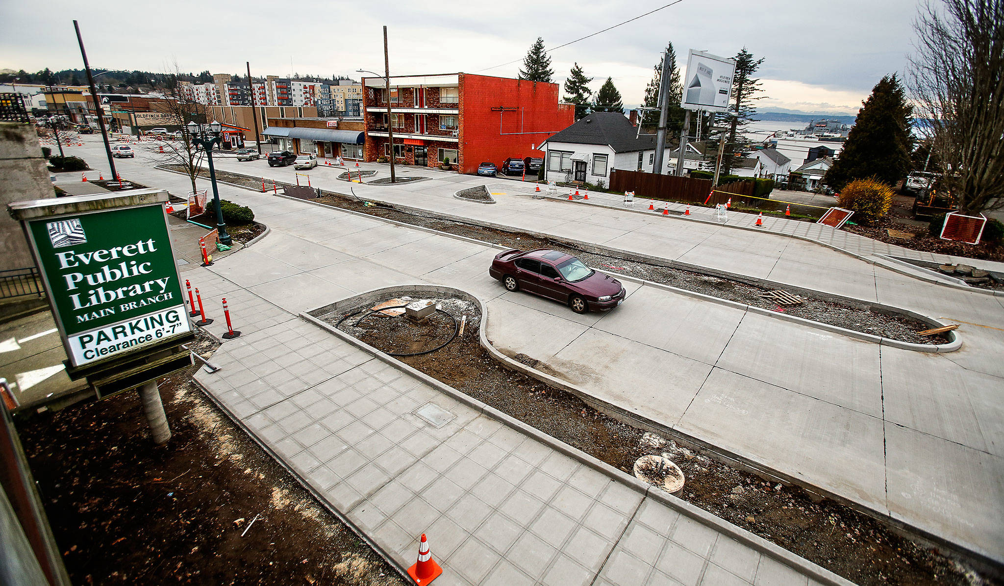 The Rucker Renewal project, which is nearing completion after months of work, means southbound drivers on Rucker Avenue will no longer be able to enter the Everett Public Library parking garage on the north-south street because of a median strip. (Dan Bates / The Herald)