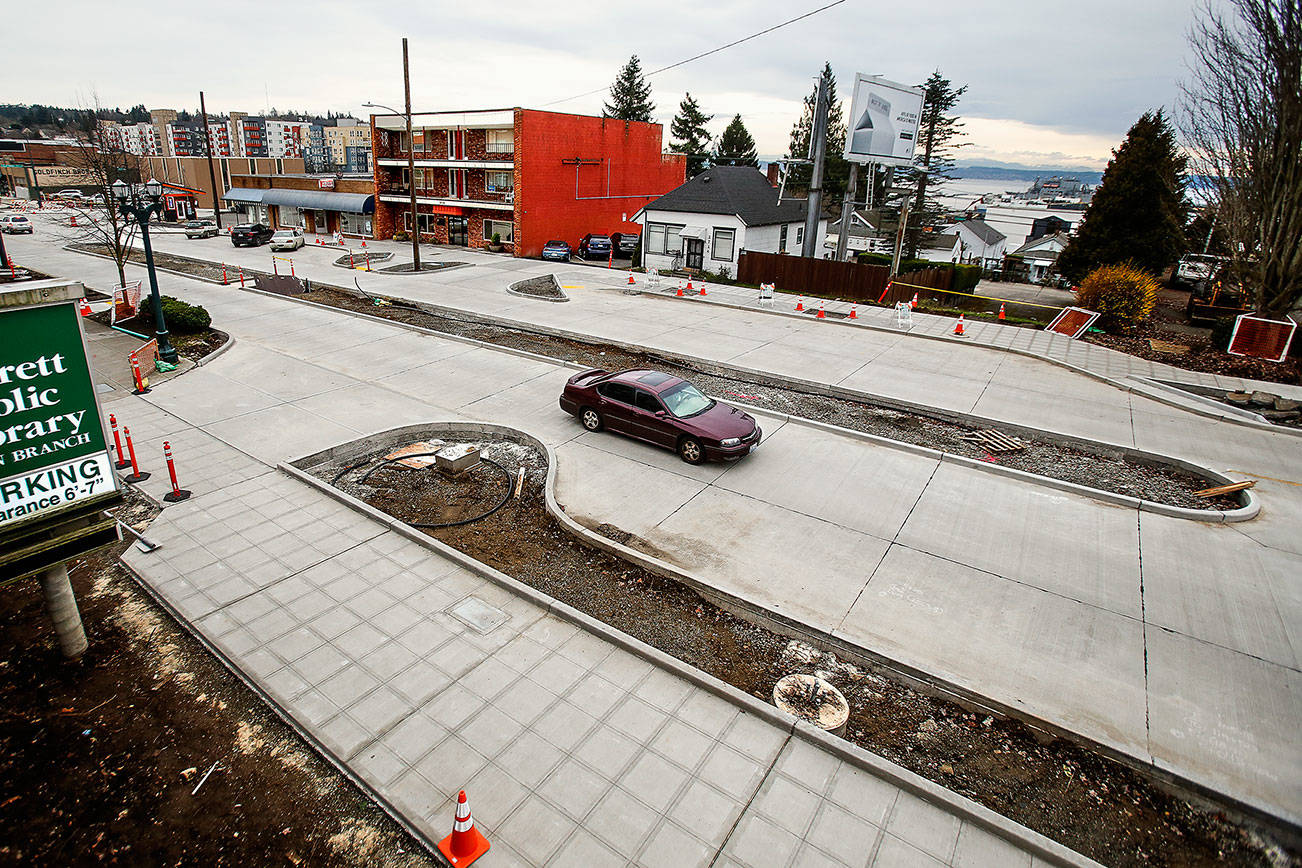 The Rucker Renewal project, which is nearing completion after months of work, means southbound drivers on Rucker Avenue will no longer be able to enter the Everett Public Library parking garage on the north-south street because of a median strip. (Dan Bates / The Herald)