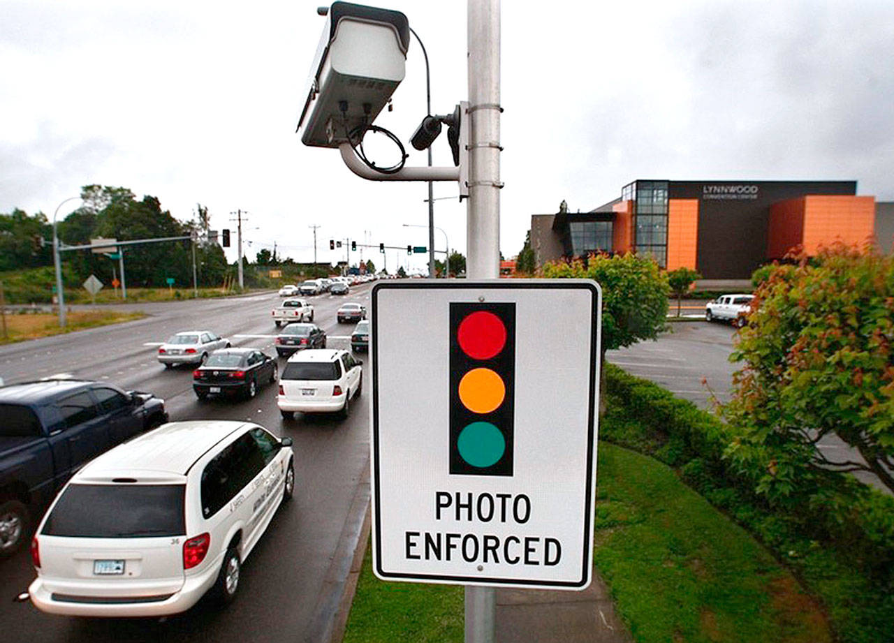 Everett could join Lynnwood as the second Snohomish County city to use traffic-enforcement cameras at intersections and school zones. (Dan Bates / Herald file photo)
