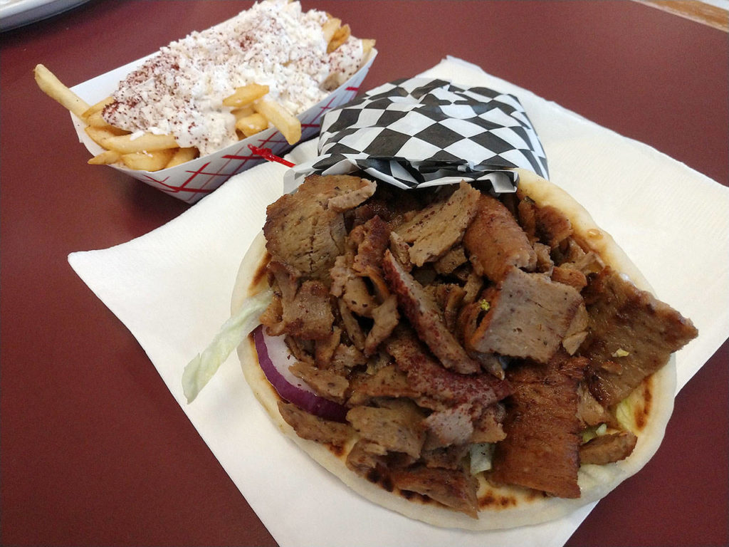 You can order a gyro with fries and a soft drink for $8.99 at the Gyro House in Everett. Upgrade to Greek fries for 50 cents more. (Sara Bruestle/The Herald)
