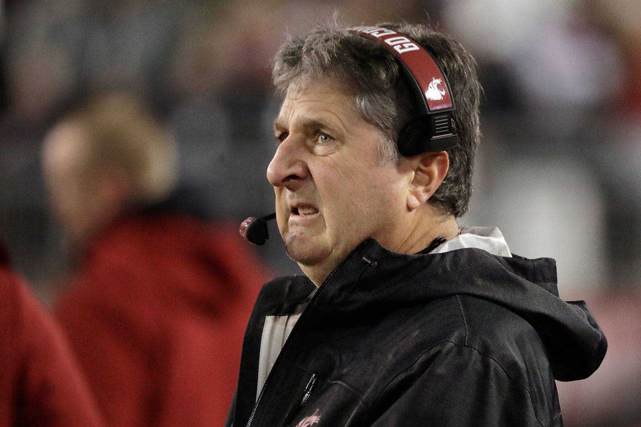 Washington State coach Mike Leach looks toward the scoreboard during the first half of a game against Oregon State on Nov. 23, 2019, in Pullman. (AP Photo/Ted S. Warren)