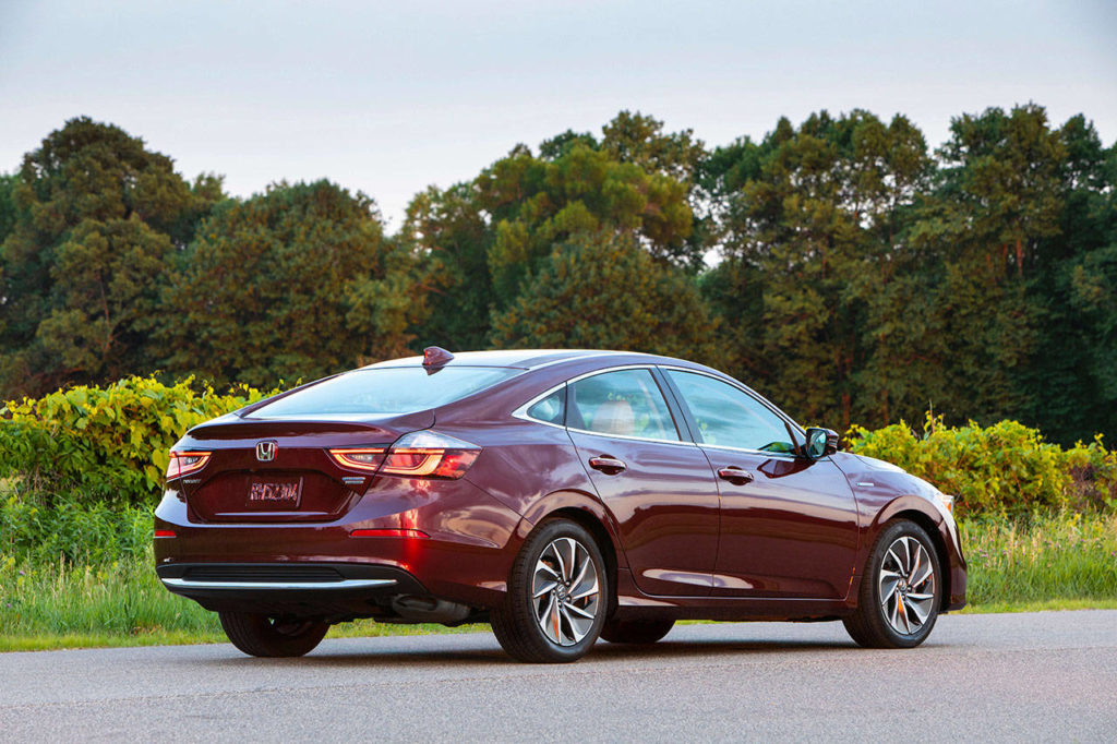 The spacious trunk of the 2020 Honda Insight hybrid sedan is increased in EX and Touring models by rear seatbacks that fold down. (Honda) 
