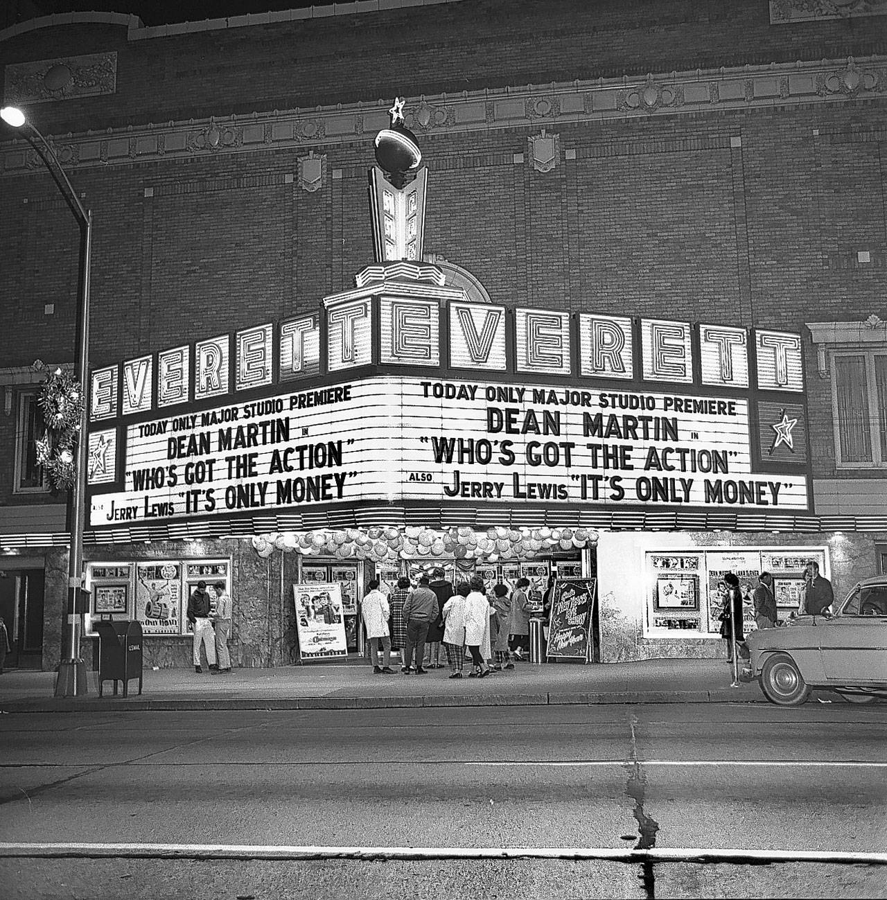 A New Year’s Party at the Everett Theatre on Dec. 31, 1962. The twin bill reunited the comedy duo of Dean Martin and Jerry Lewis, at least on the theater’s Space Age-style marquee. (Herald Photo courtesy of Everett Public Library)
