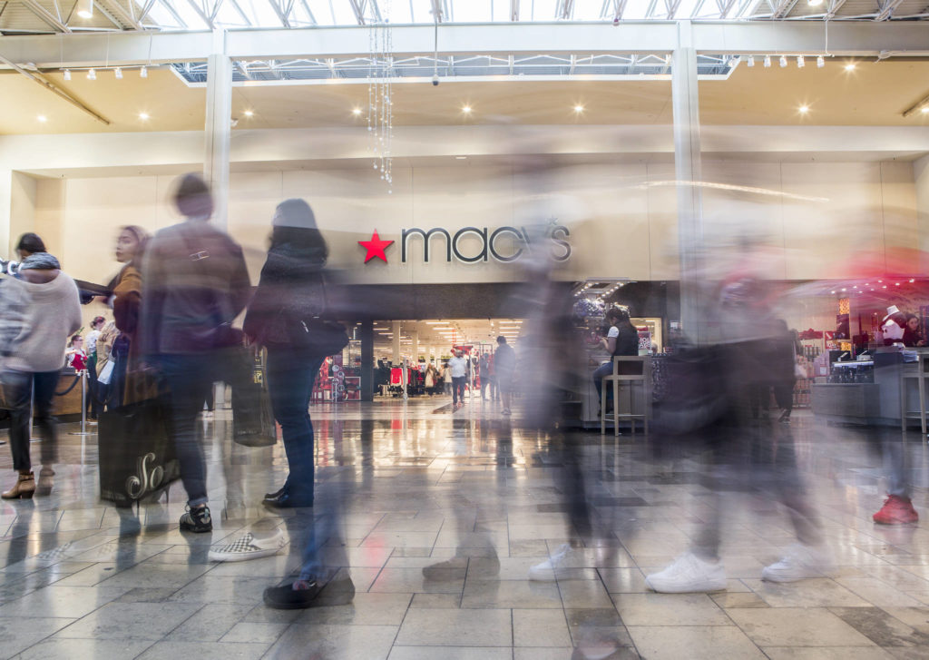 Shoppers make their way through the lines and crowds of people during Black Friday at Alderwood Mall on Nov. 29 in Lynnwood. (Olivia Vanni / The Herald)
