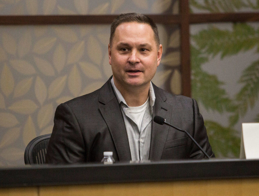 Snohomish County Sheriff candidate Adam Fortney speaks at the League of Women Voters Candidate Forum at the Snohomish County Campus on Oct. 7 in Everett. (Olivia Vanni / The Herald)
