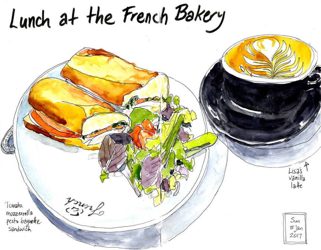 “Lunch at the French Bakery” includes sketches of a baguette sandwich and a vanilla latte.
