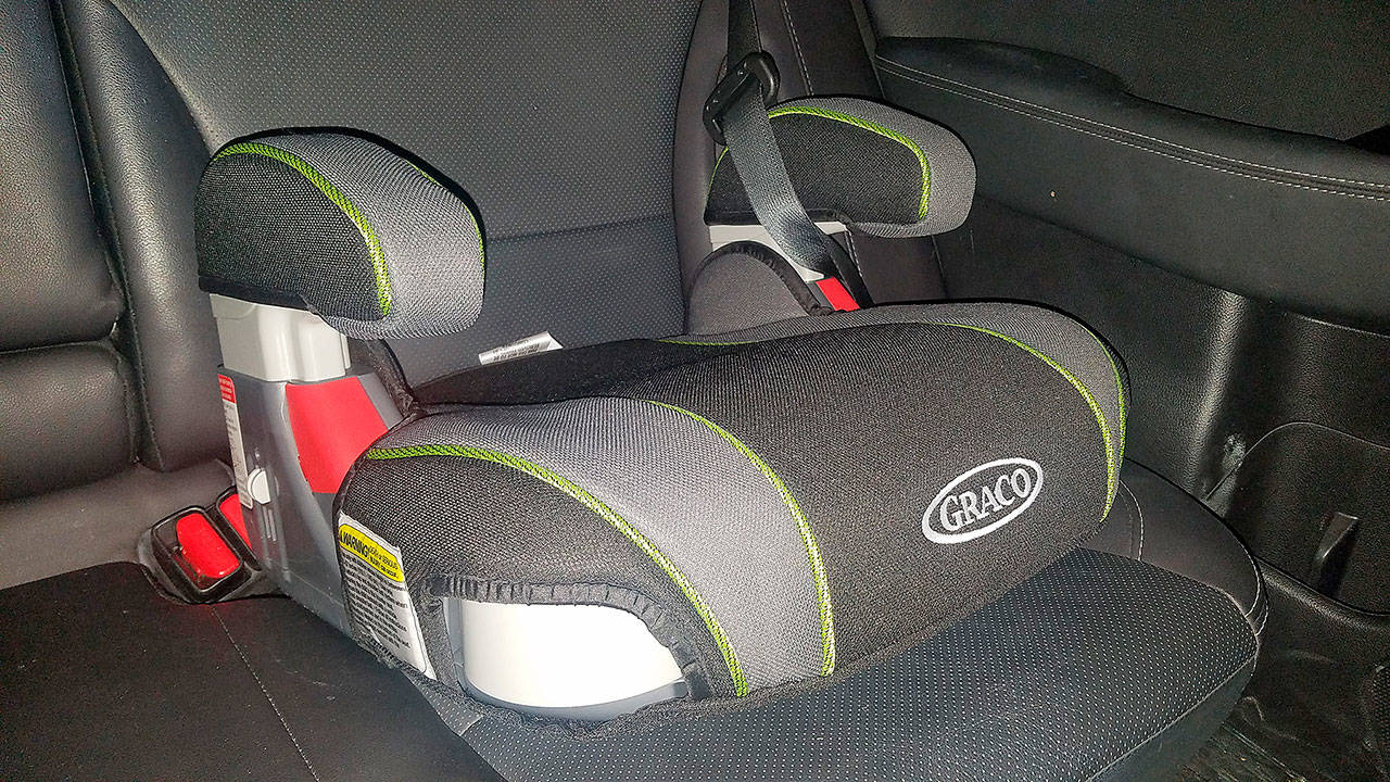 A new law that impacts children across Washington has parents dragging old booster seats out of the garage or buying brand new ones. (Jennifer Bardsley)