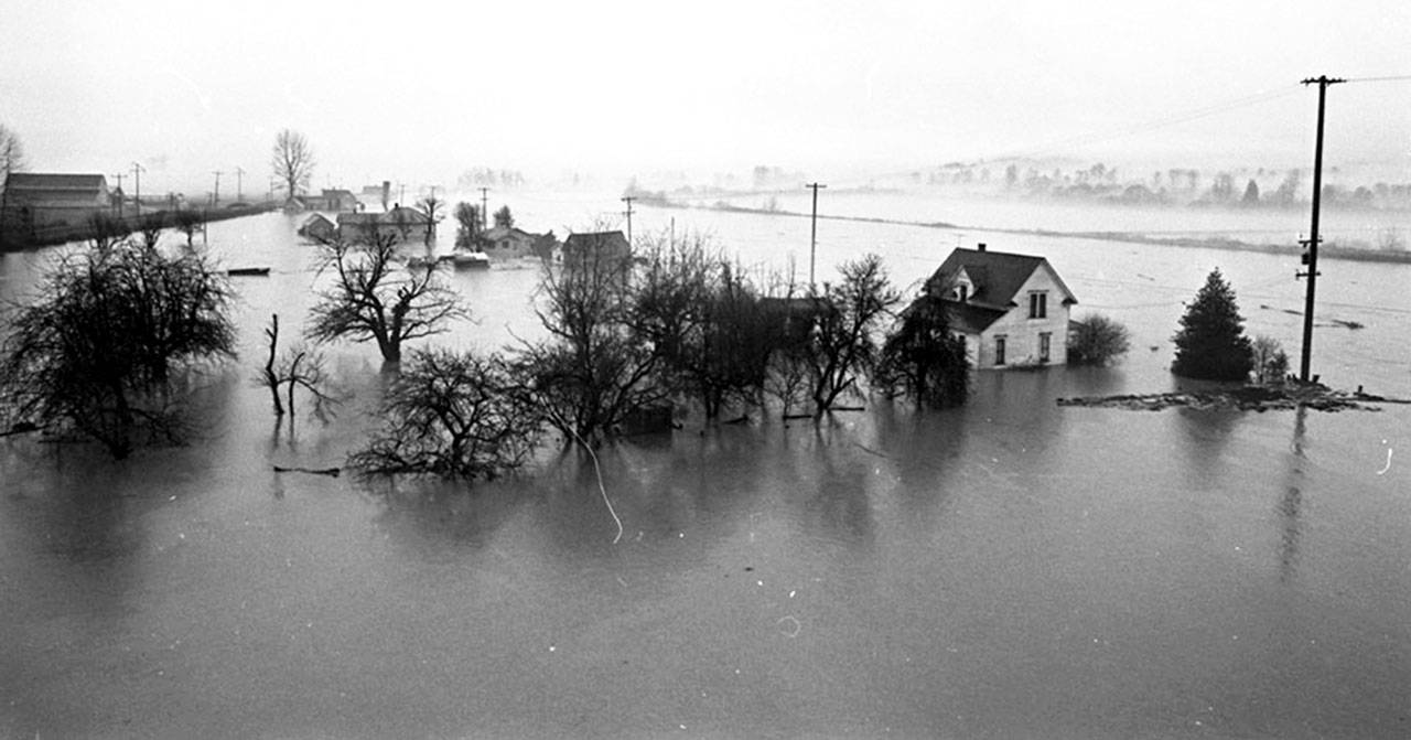 On Jan. 5, 1969, floodwaters surged out of the Snohomish River and other area waterways, flooding the valley and engulfing homes, including some near Snohomish. (Herald photo courtesy of Sno-Isle Libraries)