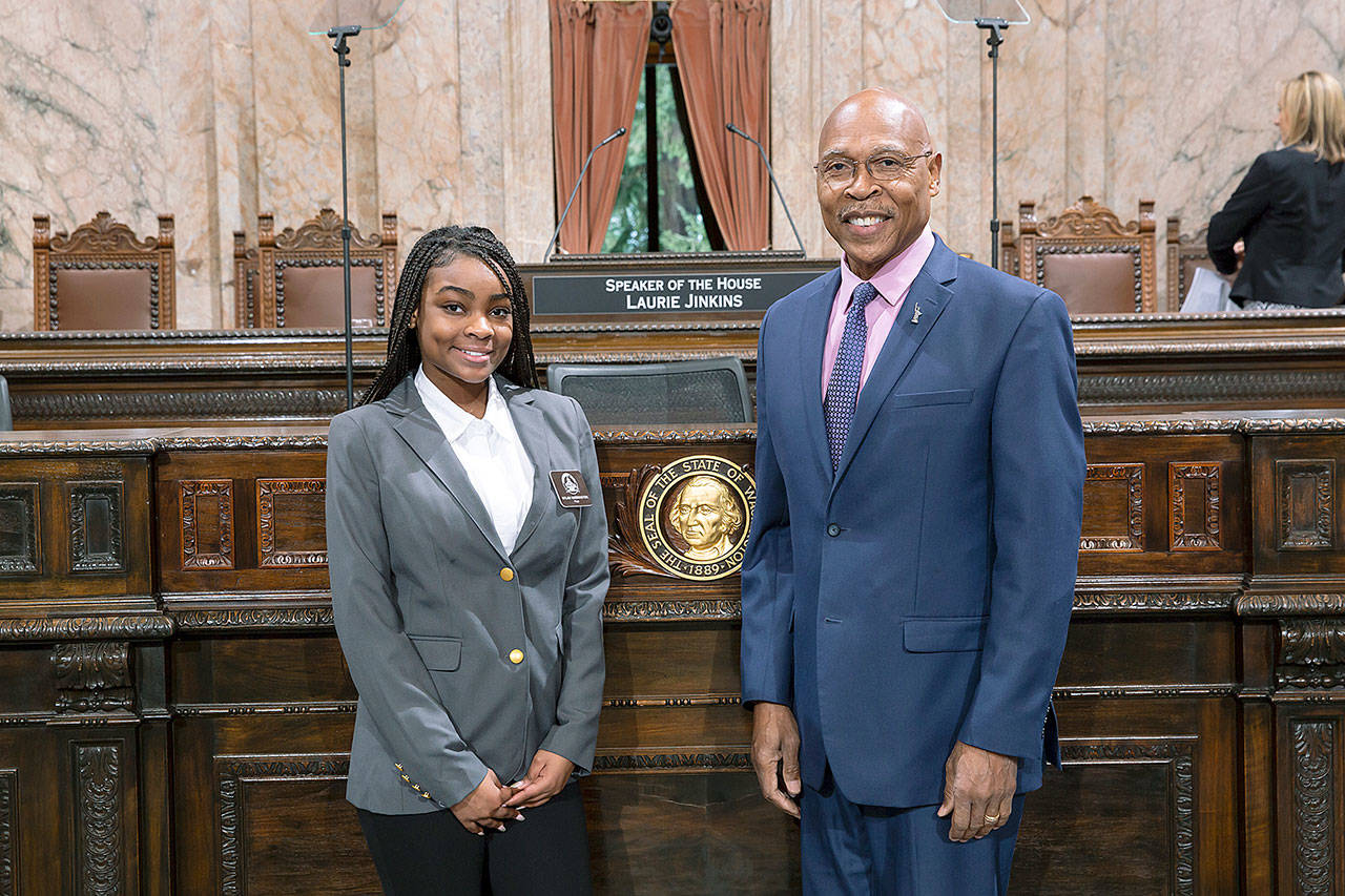 Rep. John Lovick with Nylah Harrington, a Lake Stevens High School student who spent Jan. 13 through 17 as a page with the Washington State House of Representatives. (Washington State Legislative Support Services)