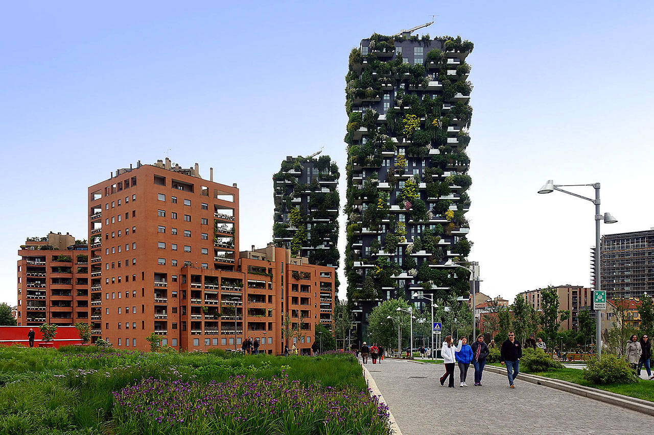 Milan’s redeveloped Porta Nuova neighborhood shows visitors a modern side of the city, including two tree-covered skyscrapers. (Rick Steves’ Europe)