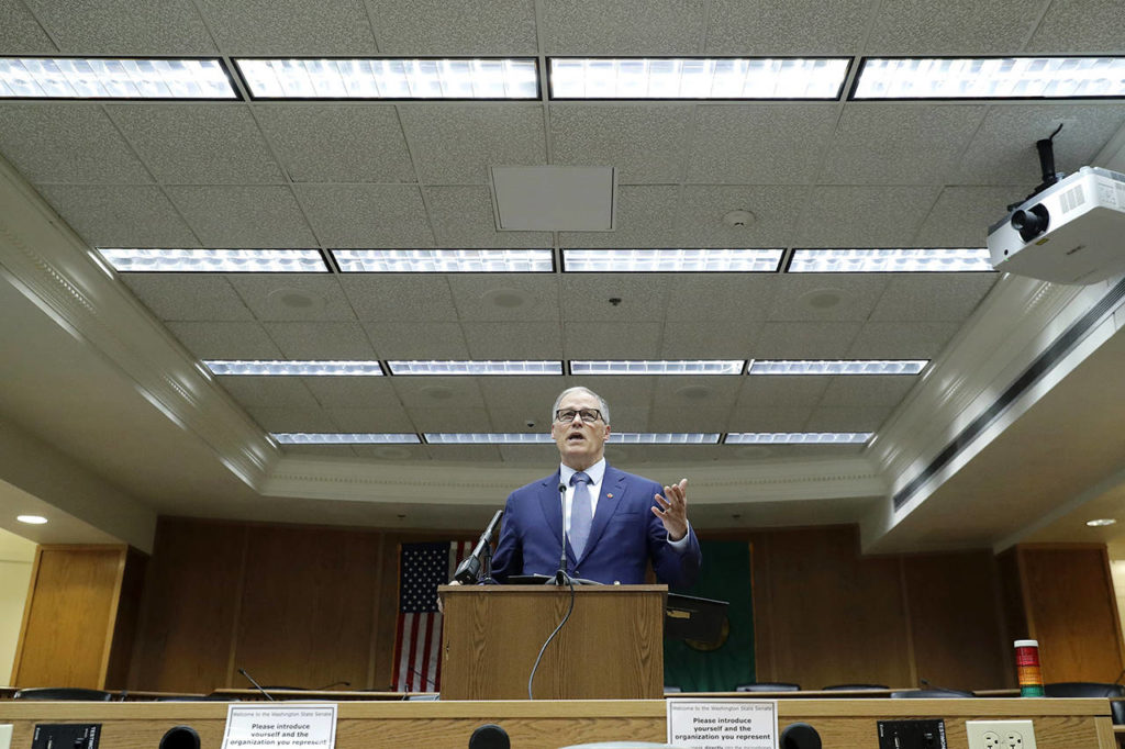 Washington Gov. Jay Inslee speaks Thursday during the AP Legislative Preview at the Capitol in Olympia. (AP Photo/Ted S. Warren)

