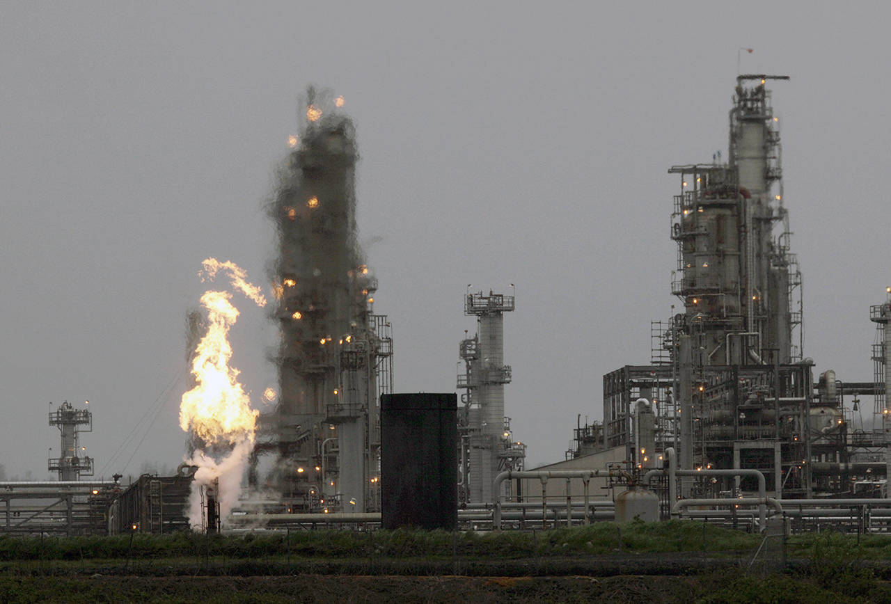 In this 2010 photo, Tesoro Anacortes Refinery is shown after a fatal overnight fire and explosion. The refinery is now called Marathon. (AP Photo/Ted S. Warren, File)