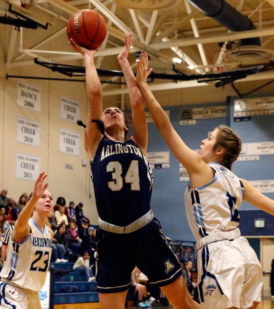 Arlington defeated Meadowdale 61-40 Friday evening at Meadowdale High School in Lynnwood on January 3, 2020. (Kevin Clark / The Herald)
