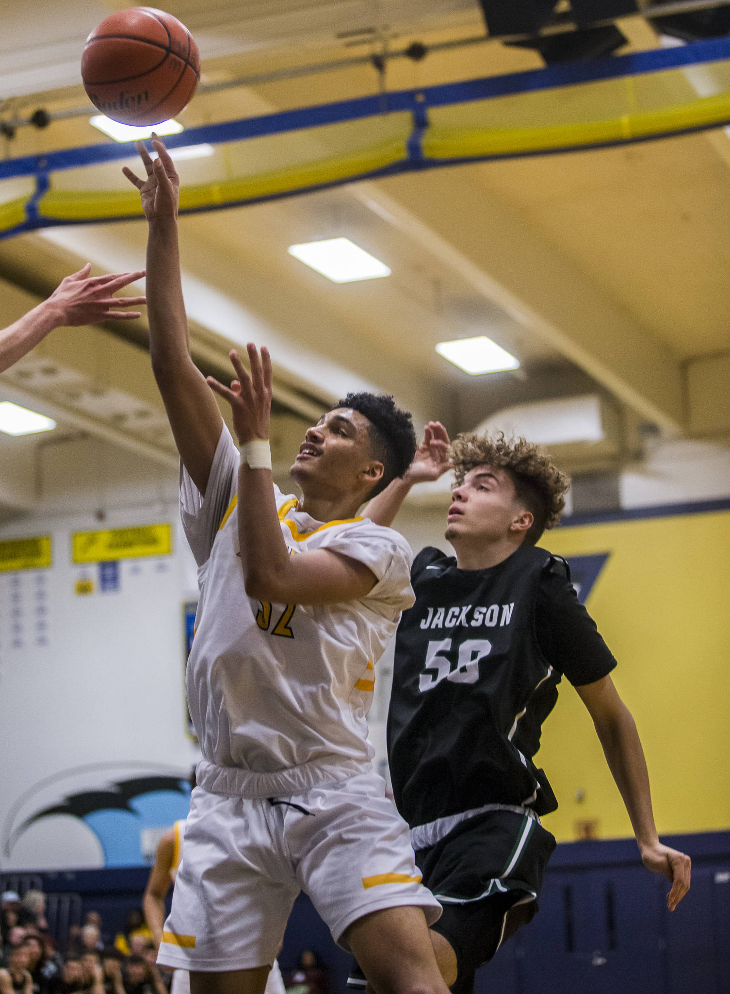 Mariner’s Henry Avra makes a jump shot during the game against Jackson at Mariner High School on Friday in Everett. (Olivia Vanni / The Herald).
