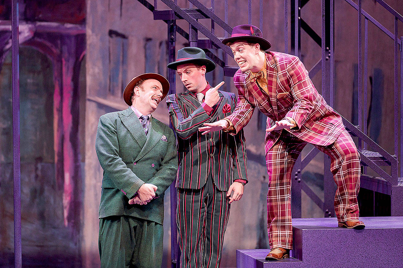 Matt Wolfe (Nathan Detroit), John David Scott (Benny Southstreet), and Kyle Nicholas Anderson (Nicely-Nicely Johnson) in a scene from Village Theatre’s “Guys & Dolls.” The musical is showing through Feb. 2 in Everett. (Mark Kitaoka / Village Theatre)