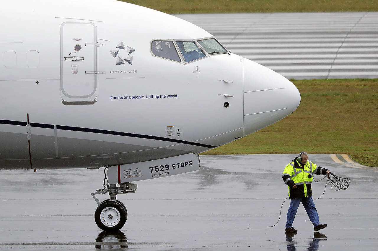 An undelivered United Airlines Boeing 737 Max airplane prepares to take off Dec. 11 at Renton Municipal Airport. (AP Photo/Ted S. Warren)