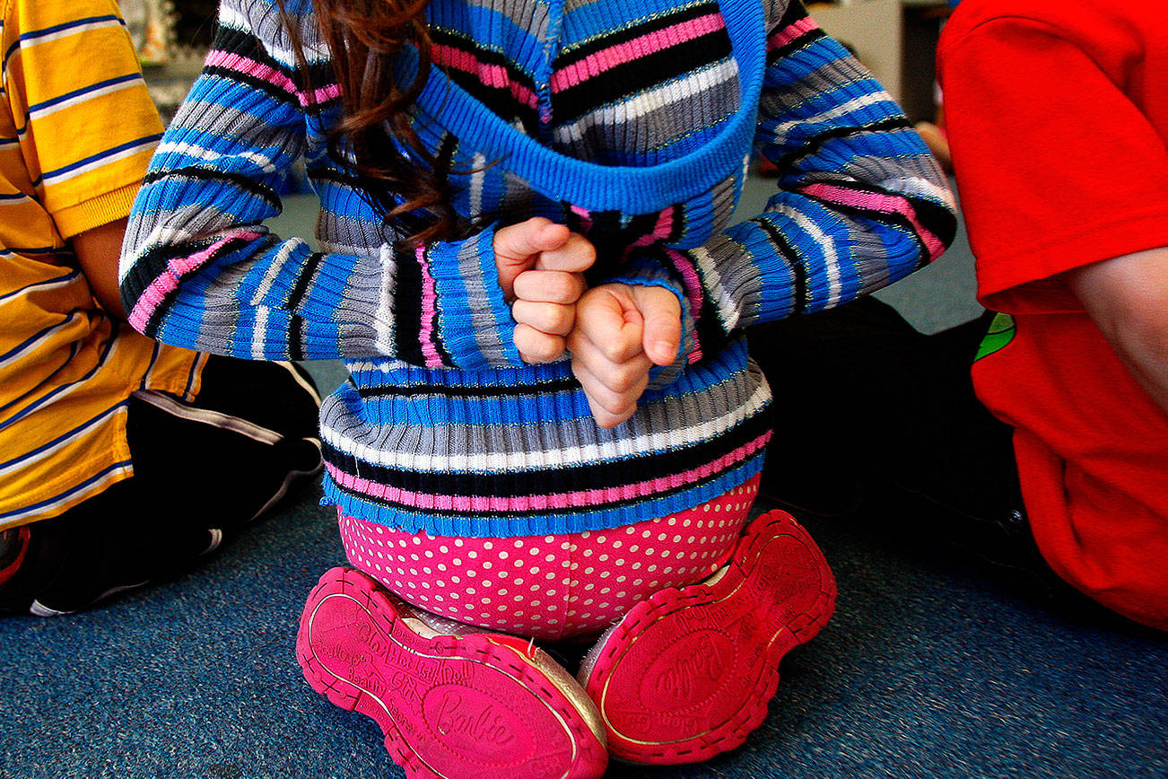 Children in a kindergarten class at Everett’s Madison Elementary School practice counting — at least one did so without using her fingers. The district is launching a new Transitional Kindergarten program this month. (Samuel Wilson / The Herald)