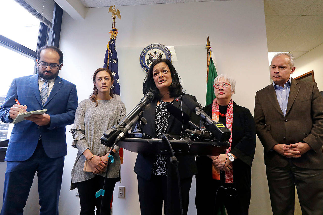 Rep. Pramila Jayapal, D-Wash. (center), addresses a news conference Jan. 6 as she stands with Masih Fouladi (left), Negah Hekmati, Diane Narasaki and Jorge Baron about Hekmati’s hours-long delay returning to the U.S. from Canada with her family days earlier. (AP Photo/Elaine Thompson)