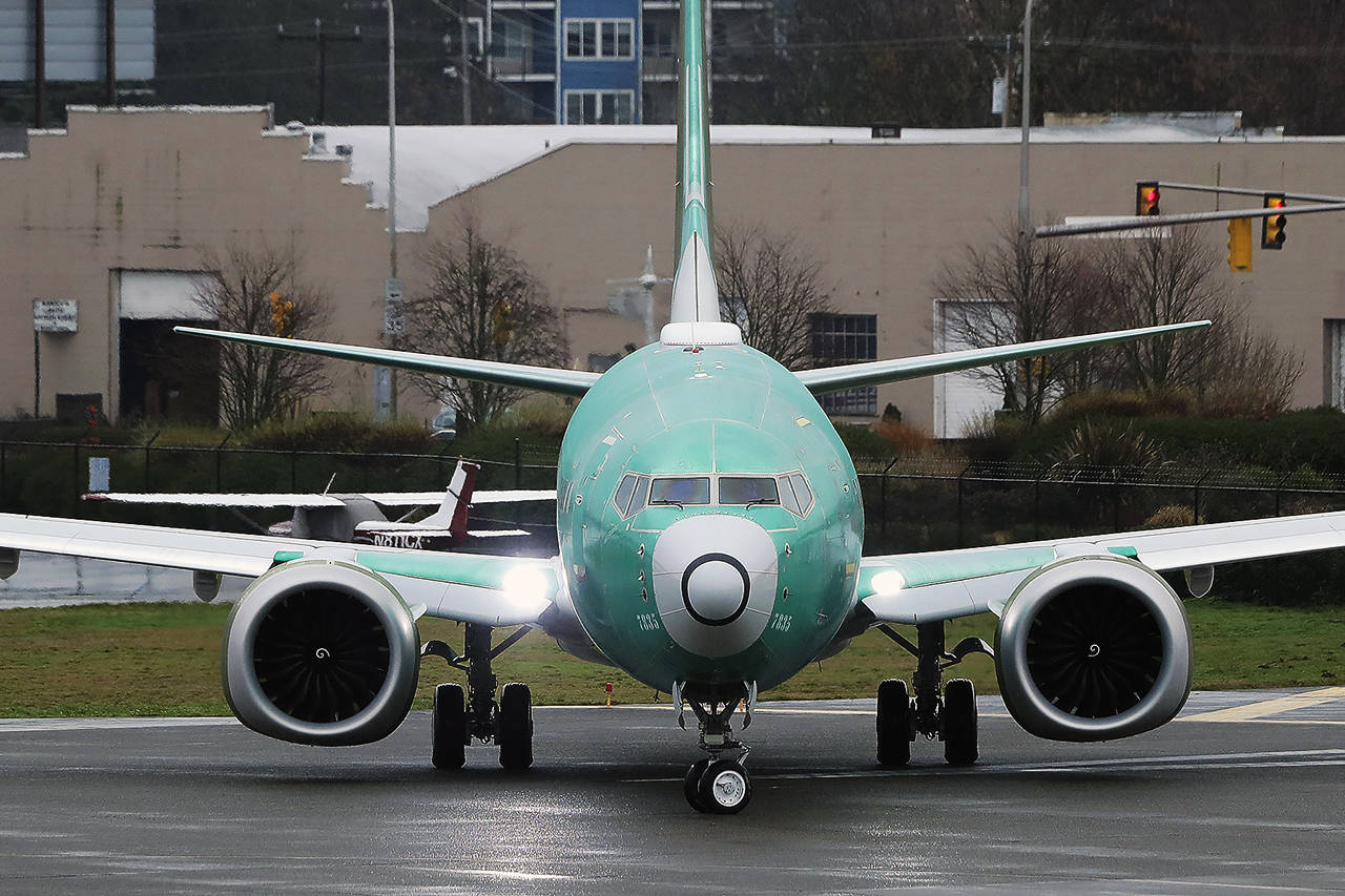 In this Dec. 11, 2019 photo, a Boeing 737 Max airplane being built for Norwegian Air International turns as it taxis for take off for a test flight at Renton Municipal Airport in Renton. (AP Photo/Ted S. Warren, File)