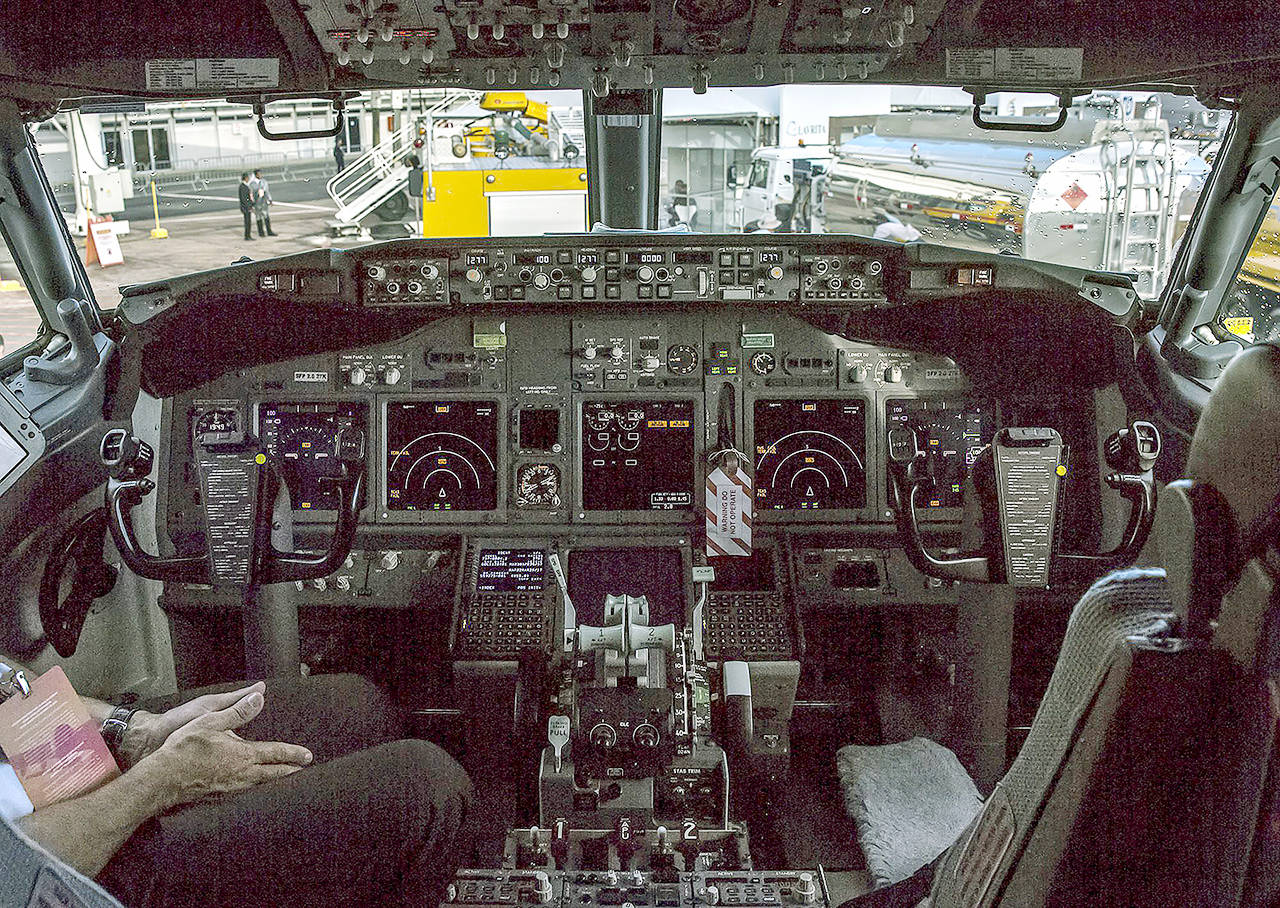 A pilot sits inside the cockpit of a Boeing 737-800 during the International Brazil Air Show at Rio Galeao International Airport in Rio de Janeiro on April 1, 2017. (Dado Galdieri/Bloomberg file)