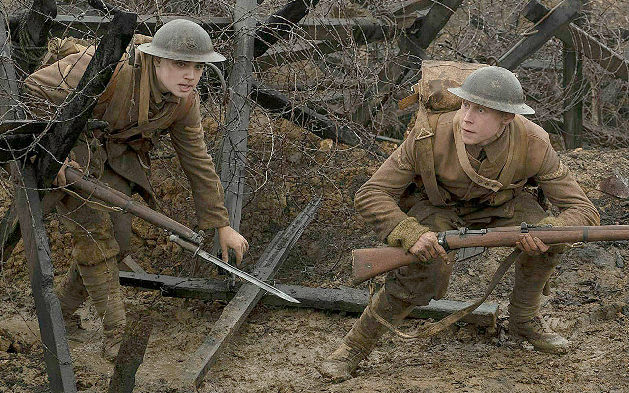 In “1917,” Dean-Charles Chapman (left) and George MacKay play British World War I soldiers on an extremely perilous mission in No Man’s Land. (Universal Pictures and DreamWorks Pictures)