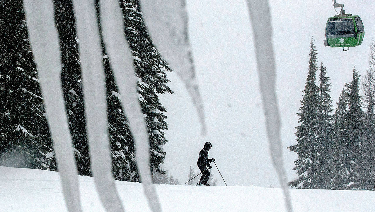 In this 2013 photo, a skier takes advantage of the snowy conditions at Silver Mountain in Kellogg, Idaho. (Kathy Plonka/The Spokesman-Review via AP, file)