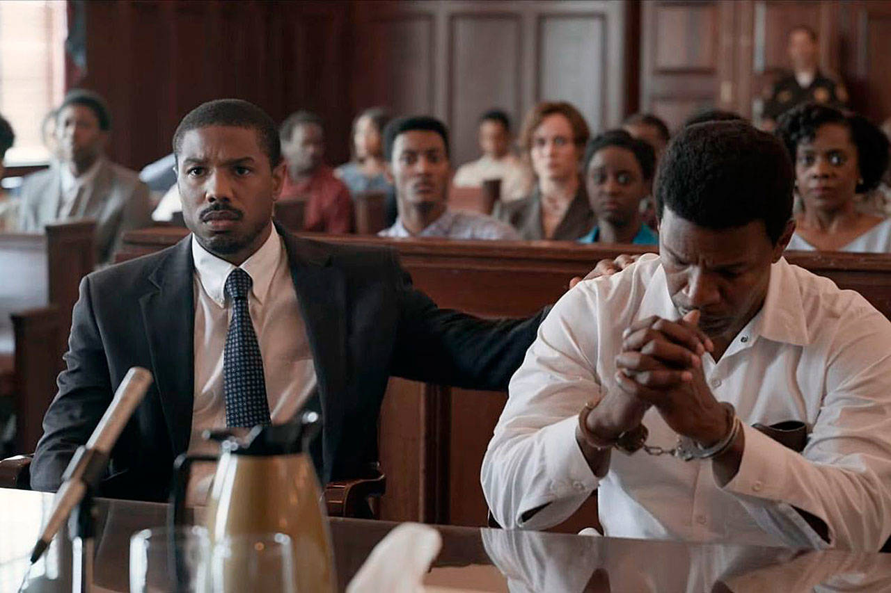 Michael B. Jordan (left) plays a crusading lawyer who takes up the case of a Death Row inmate (Jamie Foxx) in “Just Mercy.” (Warner Bros)