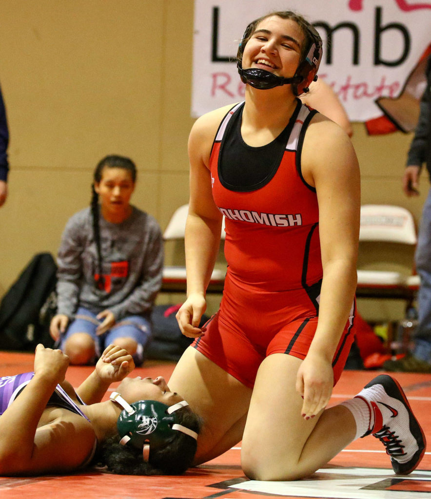 Snohomish’s Alycia Pidgeon (right) is all smiles after pinning Edmonds-Woodway’s Destiny Harris in the first period Wednesday evening at Snohomish High School on January 8, 2020. (Kevin Clark / The Herald)
