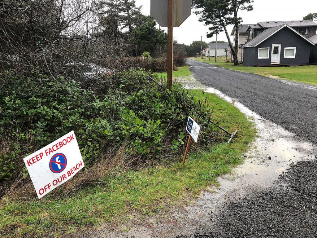 A sign expressing opposition to a plan by Facebook to build a landing spot for a submarine cable connecting America with Asia stands on property in the tiny community of Tierra del Mar, Oregon, on Wednesday. (AP Photo/Andrew Selsky)

