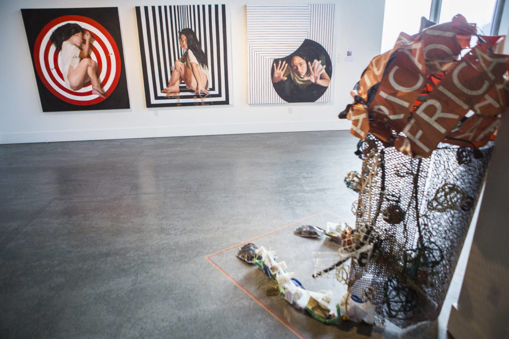 Hoa Hong and Marita Dingus’ art are part of a two-artist exhibit at the Schack Art Center. (Olivia Vanni / The Herald).
