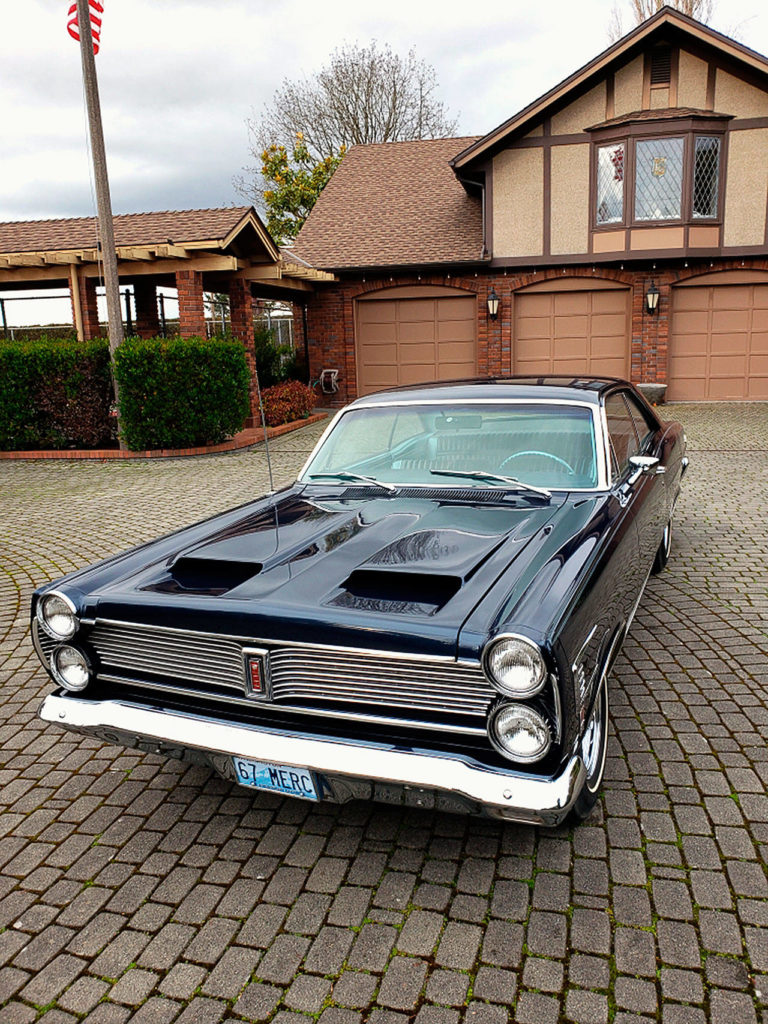Larry Jubie’s near perfect 1967 Mecury Caliente, shown here at his Everett home, is one of only four made. He sold the car Thursday at an auction in Arizona and is donating the proceeds to the Providence General Foundation.
