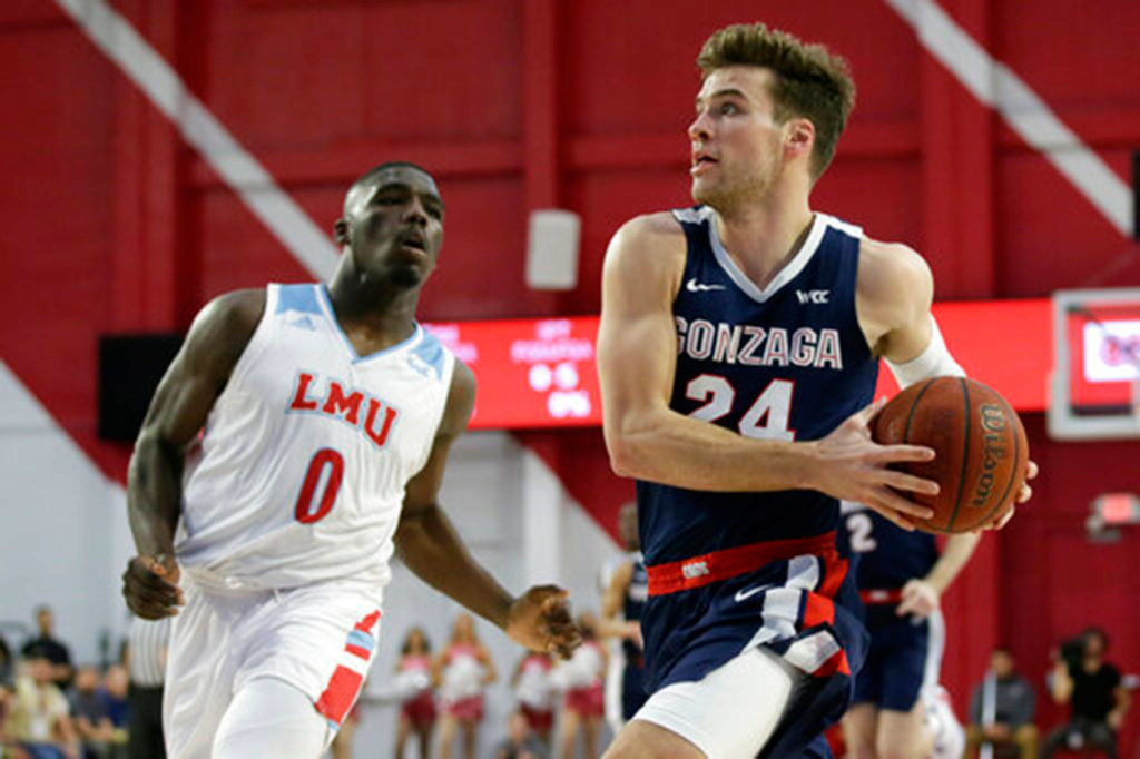 Gonzaga forward Corey Kispert (24), a King’s High School alum, drives to the basket during a game against Loyola Marymount on Jan. 11, 2020, in Los Angeles. (AP Photo/Alex Gallardo)
