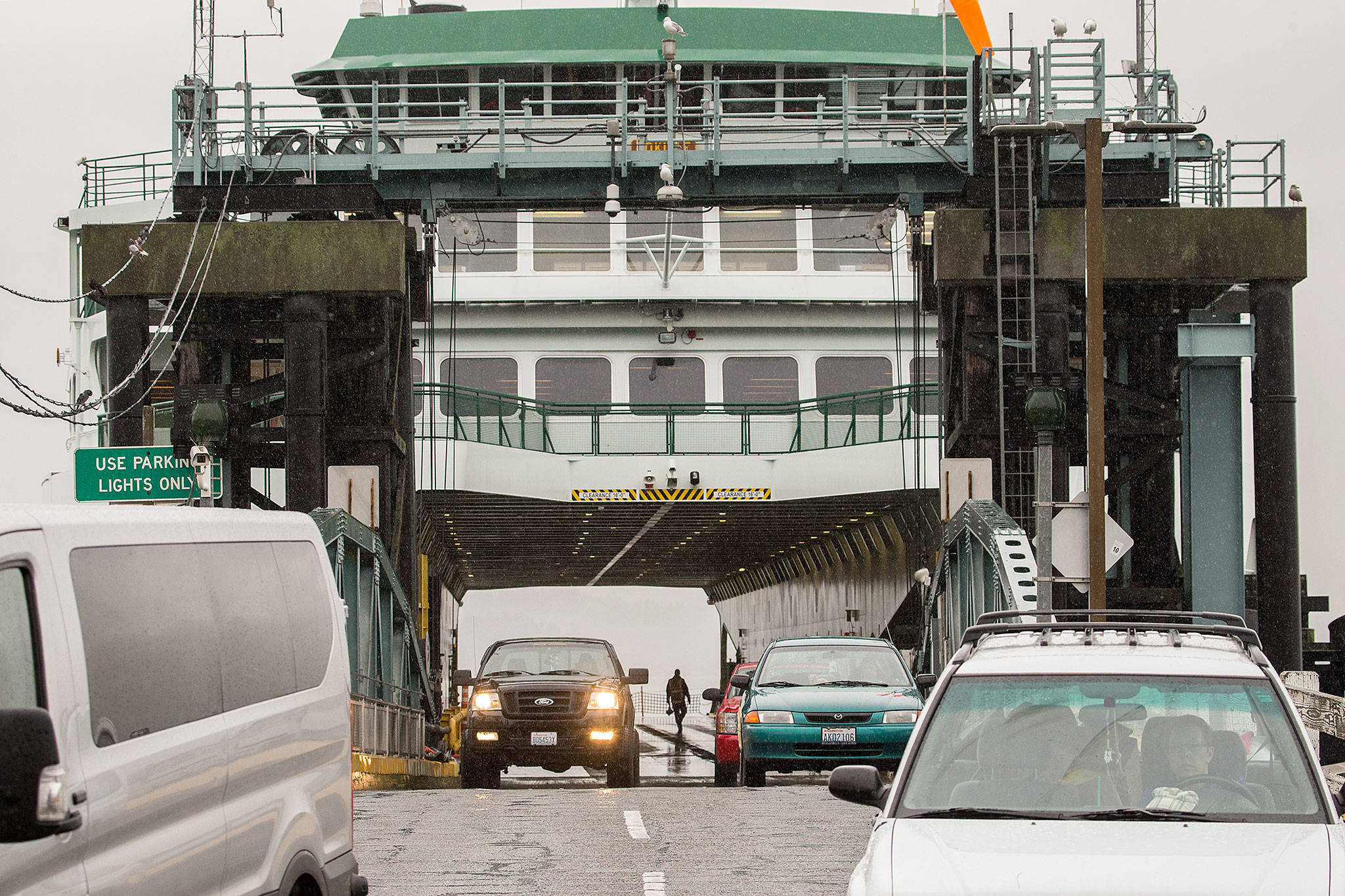Commuters from Whidbey Island disembark their vehicles from the ferry Tokitae 2018 in Mukilteo. (Andy Bronson / Herald file)