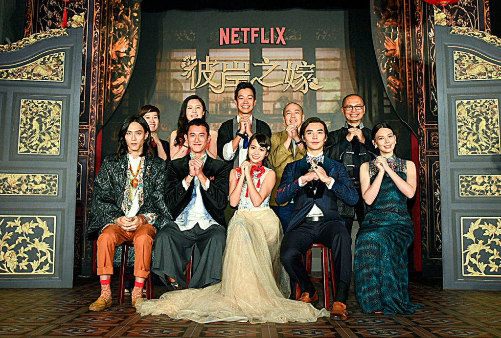 The cast of the new Netflix series “The Ghost Bride,” based on Choo’s book, from left to right, in the front row, are Kuang Tian, Wu Kang-jen, Huang Peijia, Ludi Lin and Teresa Daley, seen as last week’s premiere in Taiwan. In the back row, joining them, are author Yangsze Choo, show runner Kai Yu Wu, directors Quek Shio Chuan and Ho Yu Hang, and executive producer Zainir Aminullah. (Netflix)
