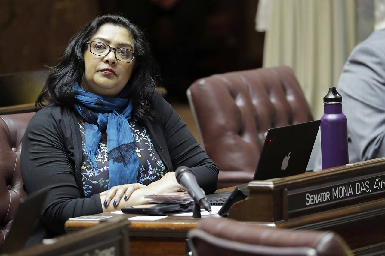 Washington Sen. Mona Das, D-Kent, listens to debate on the Senate floor on a bill she sponsored that bans single-use plastic bags, Wednesday at the Capitol in Olympia. (AP Photo/Ted S. Warren)