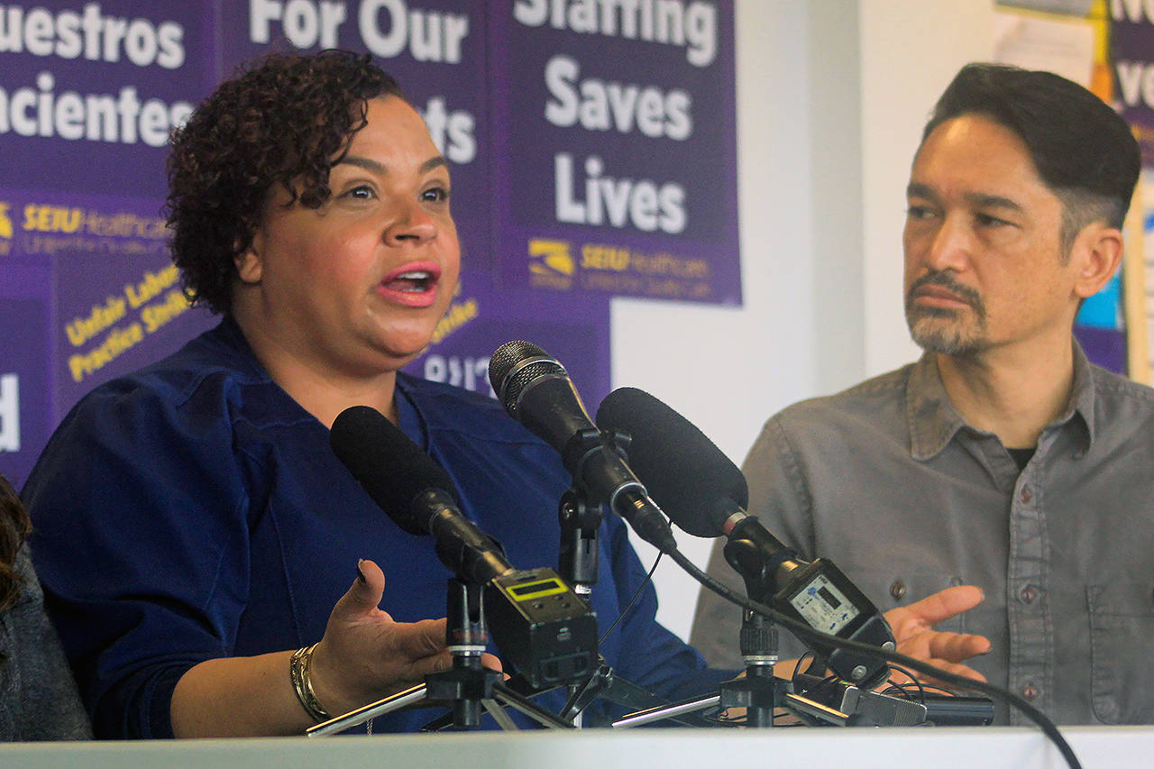 Tricia Jenkins, a nurse at Swedish’s Cherry Hill campus, talks about patient-care concerns at an SEIU Healthcare 1199NW news conference in Seattle on Friday. (Joey Thompson / The Herald)