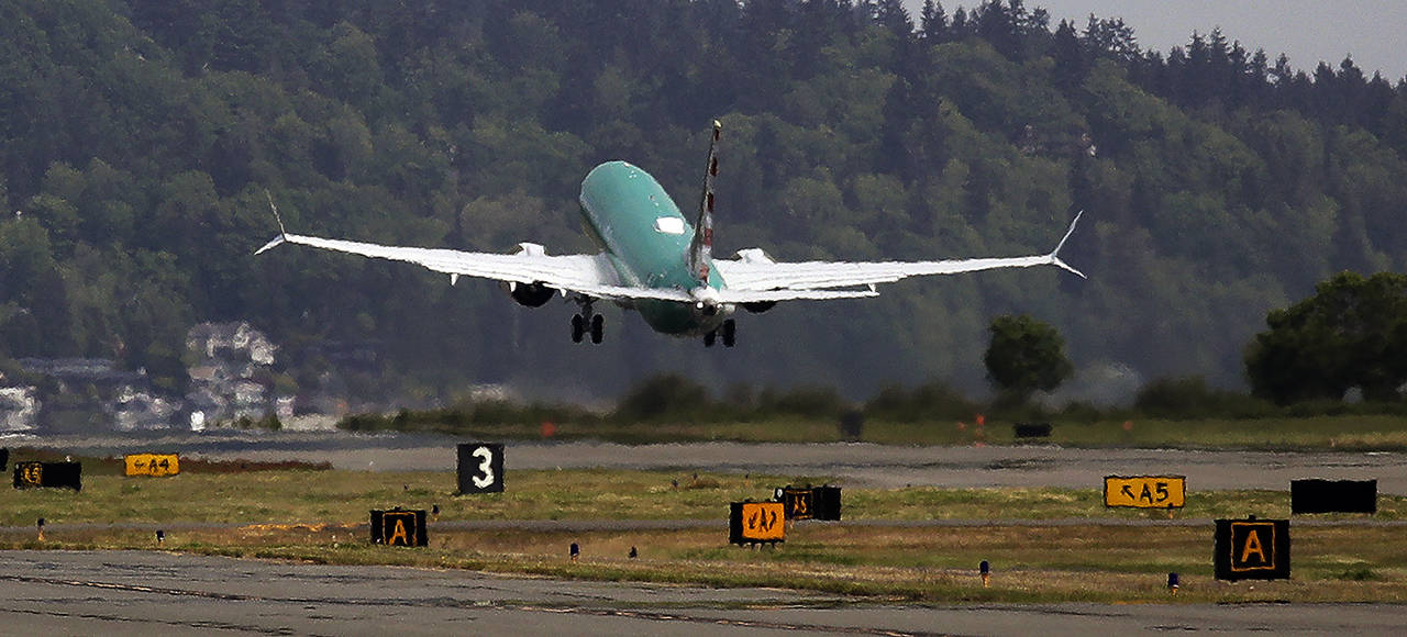 In this May 8, 2019 photo, a Boeing 737 Max 8 takes-off on a test flight in Renton. (AP Photo/Elaine Thompson, File)