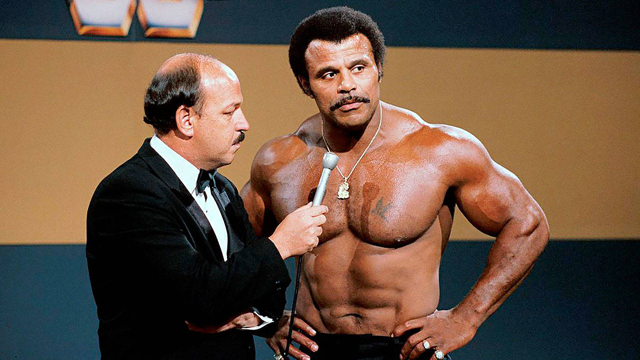 WWE Inc.                                 “Mean” Gene Okerlund interviews Rocky “Soul Man” Johnson. Johnson, a WWE Hall of Fame wrestler who became better known as the father of actor Dwayne “The Rock” Johnson, died Wednesday, Jan. 15. He was 75.